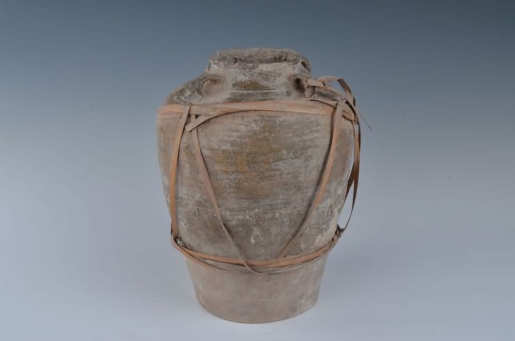 现代黄釉素面四耳陶罐