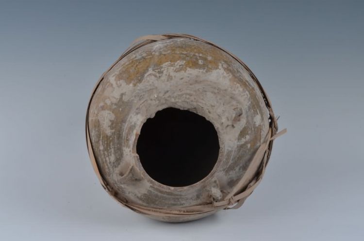 现代黄釉素面四耳陶罐